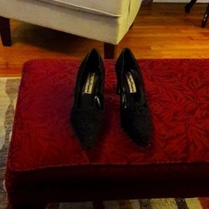 Black faux suede heels.
